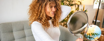 Woman styling her hair