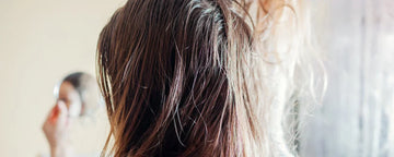 Woman with greasy hair