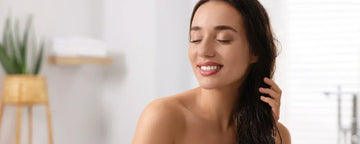 Woman touches her hair