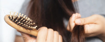Woman brushing her hair