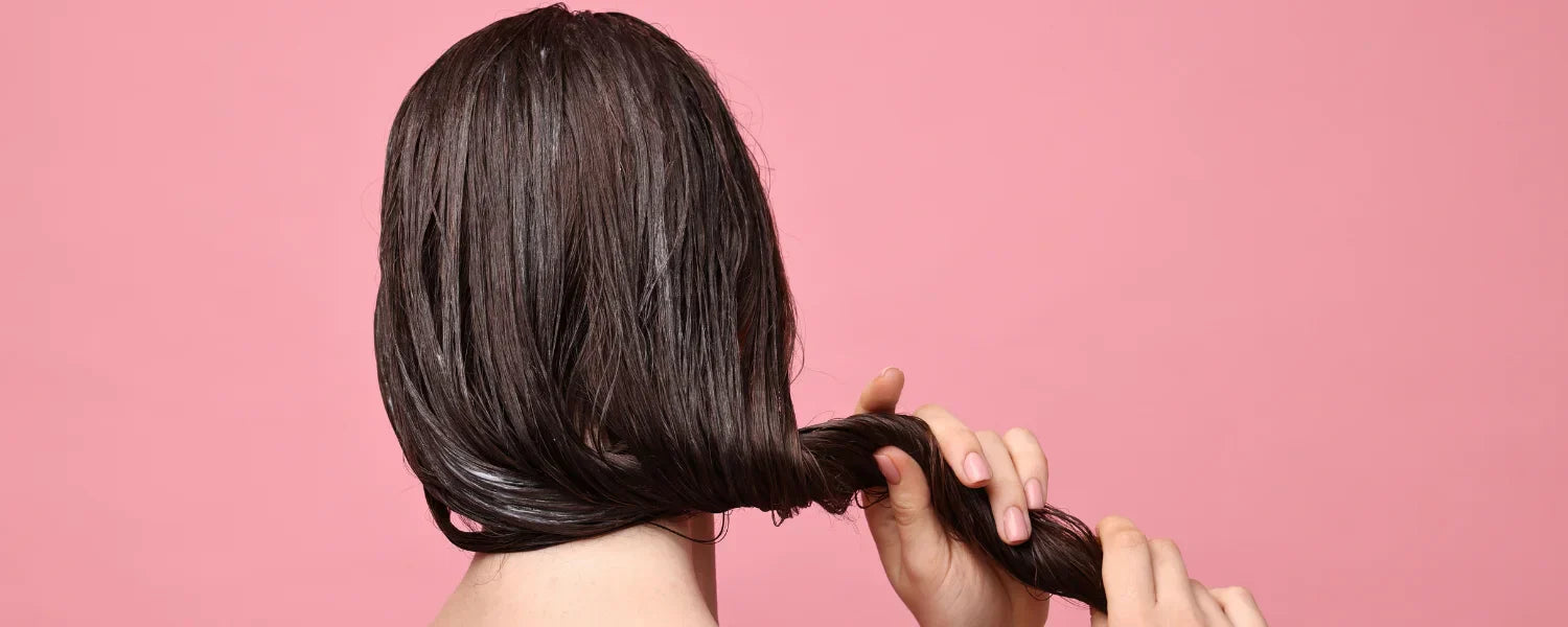 Woman using hair mask