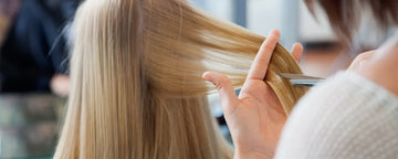 Hairdresser using thinning scissors