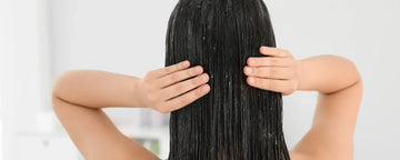 Woman using hair mask in her hair