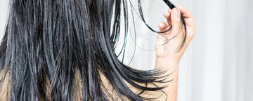 Woman with greasy hair