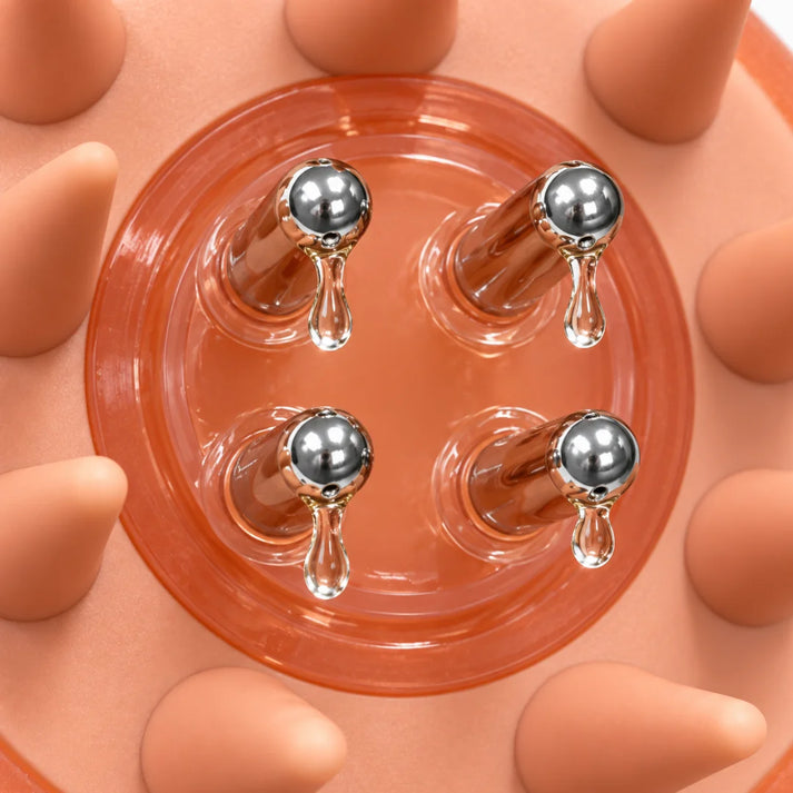 Applicateur d'huile pour cuir chevelu