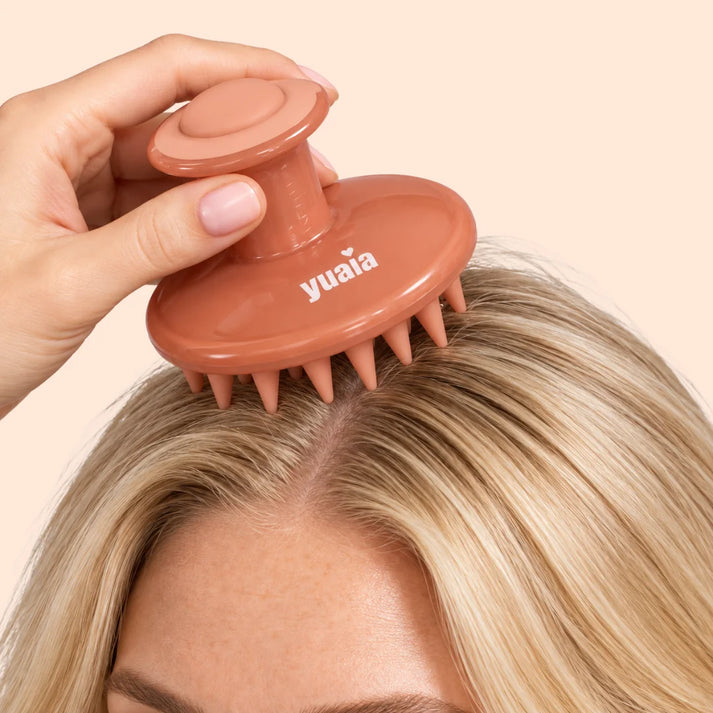 Applicateur d'huile pour cuir chevelu