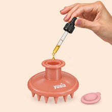 Applicateur d'huile pour cuir chevelu